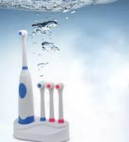 Электрическая зубная щетка с тремя запасными насадкам ALI